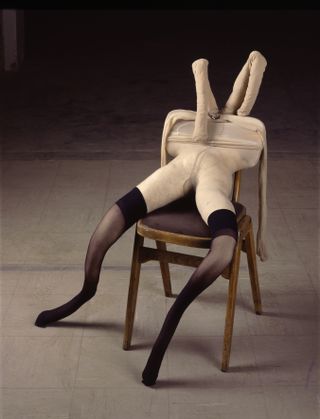 Figure made from tights in chair