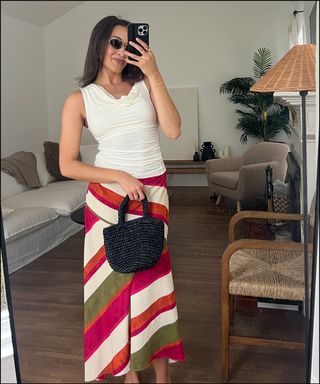 woman in mirror wearing summer outfits