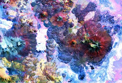 Our planet's continents may have formed beneath large mountain ranges like the Andes along the Chile-Bolivia border, shown here in a Terra satellite image.