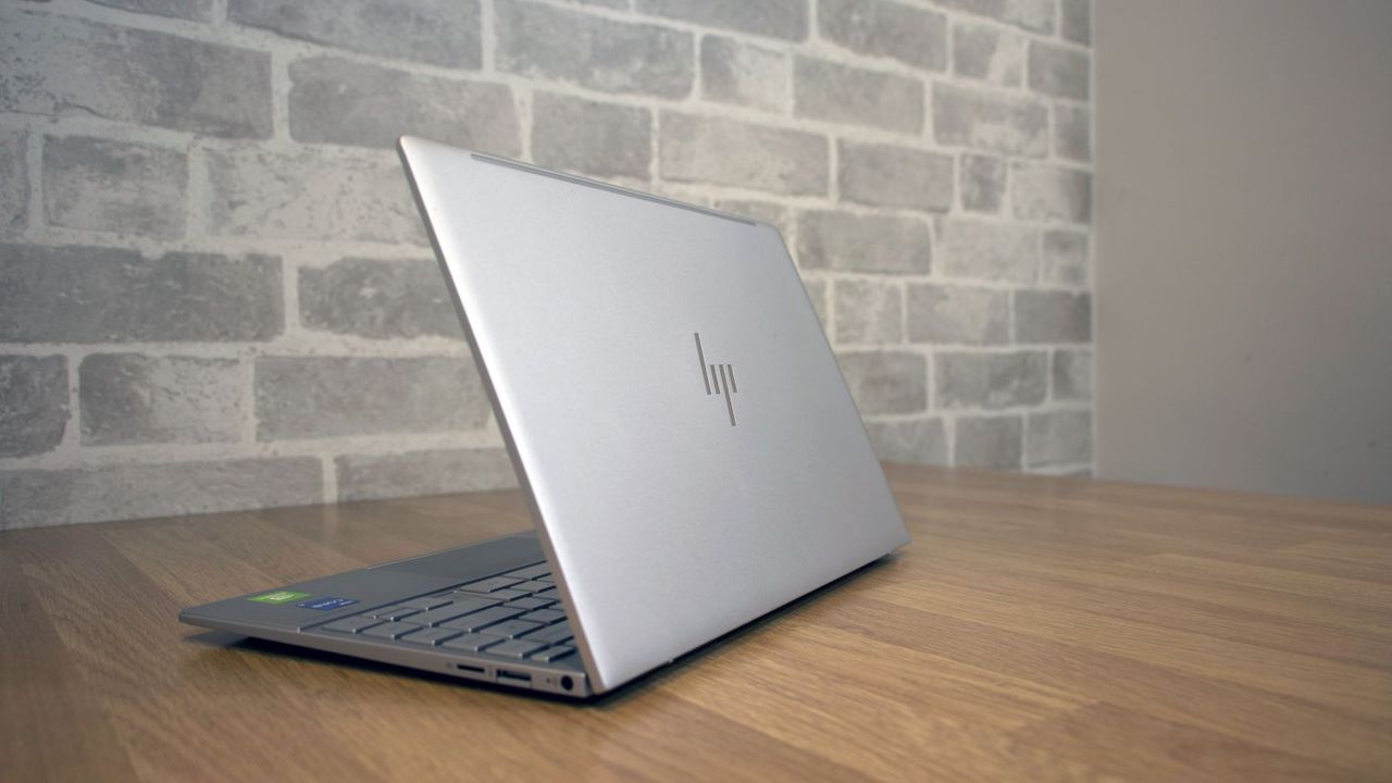 A photograph of the rear of the HP Envy 13 on a table