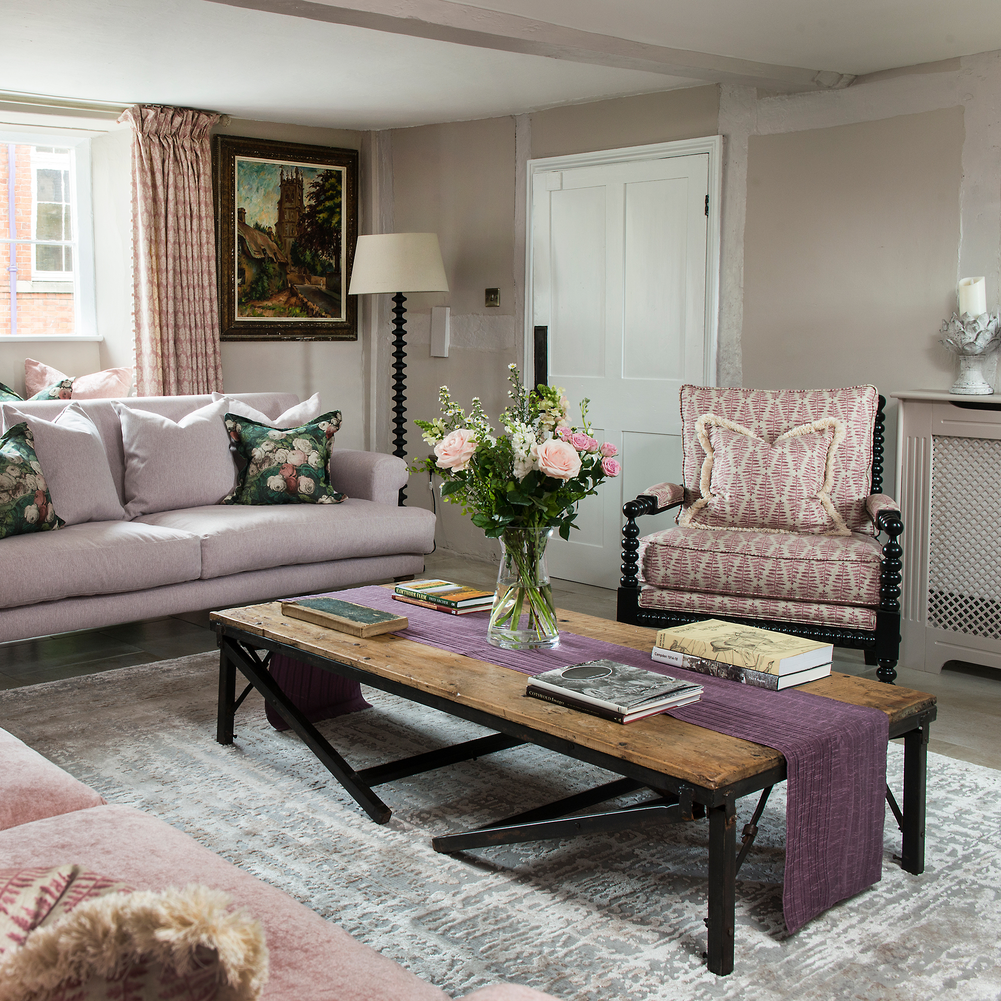 pink and taupe modern country style living room in a cottage