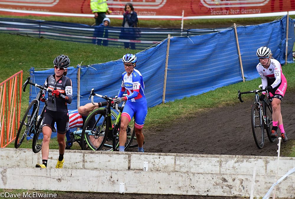 Katie Compton (Trek Factory Team) crashing hard at the barriers halfway through lap three
