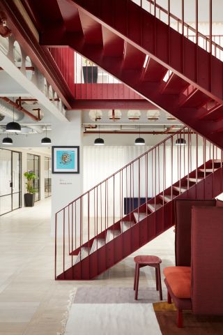 Reading now has a Fora workspace courtesy of Piercy & company, featuring a bright red staircase at its heart