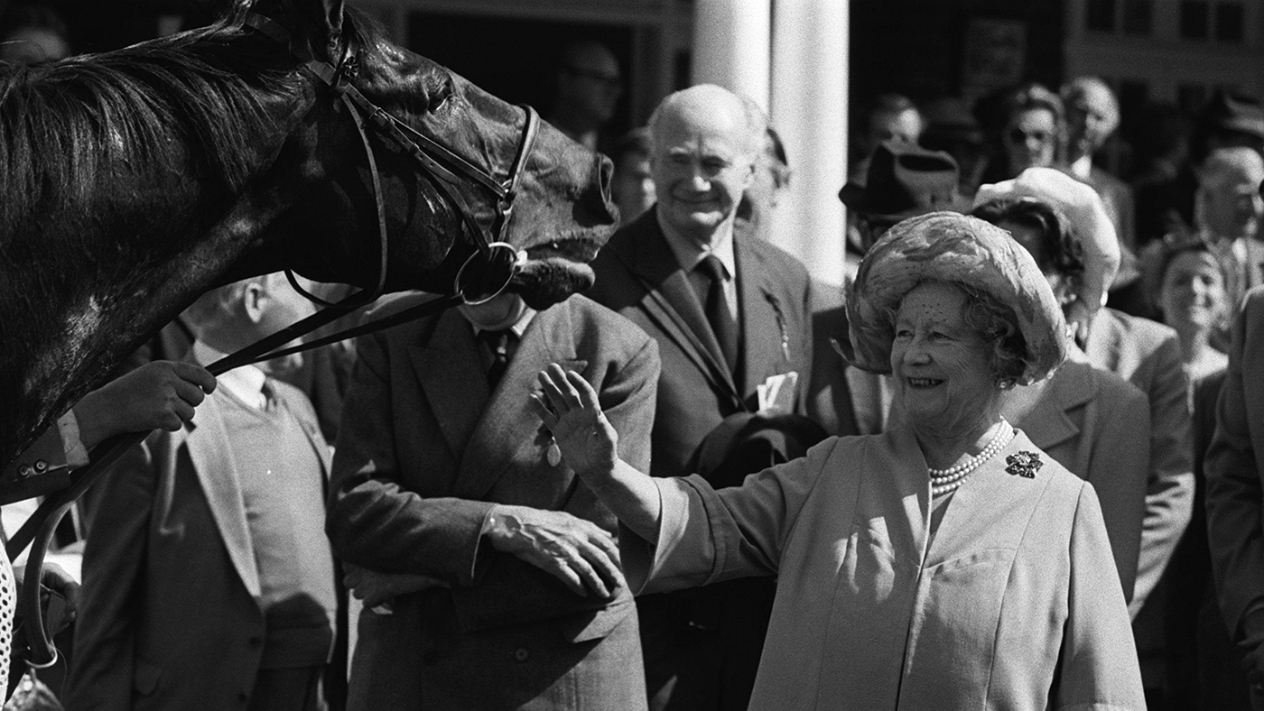The Queen Mother at Sandown races with her horse Special Cargo after winning the Whitbread Gold Cup, coming from last position to snatch victory in a three-way photo-finish.