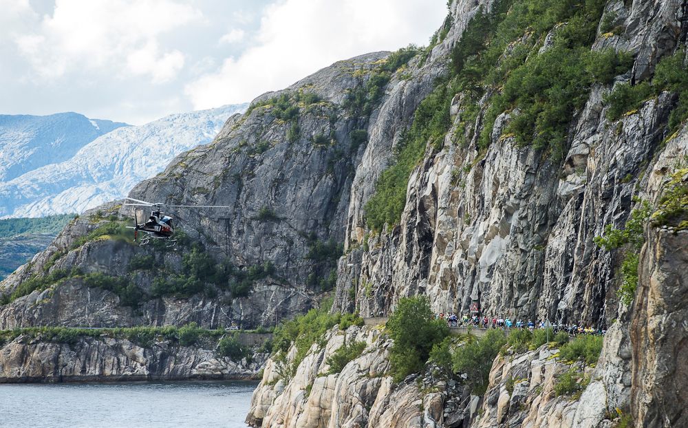 Cyclists ride during the 198,5 km second stage of the Arctic Race of Norway between Mo i Rana and Sandnessjoen