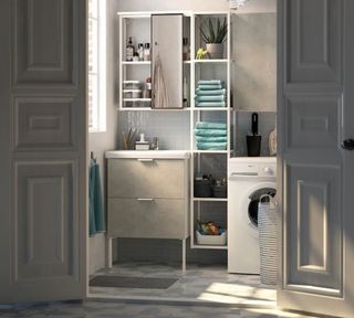 An en suite/powder room/ bathroom and laundry room with white vertical shelf