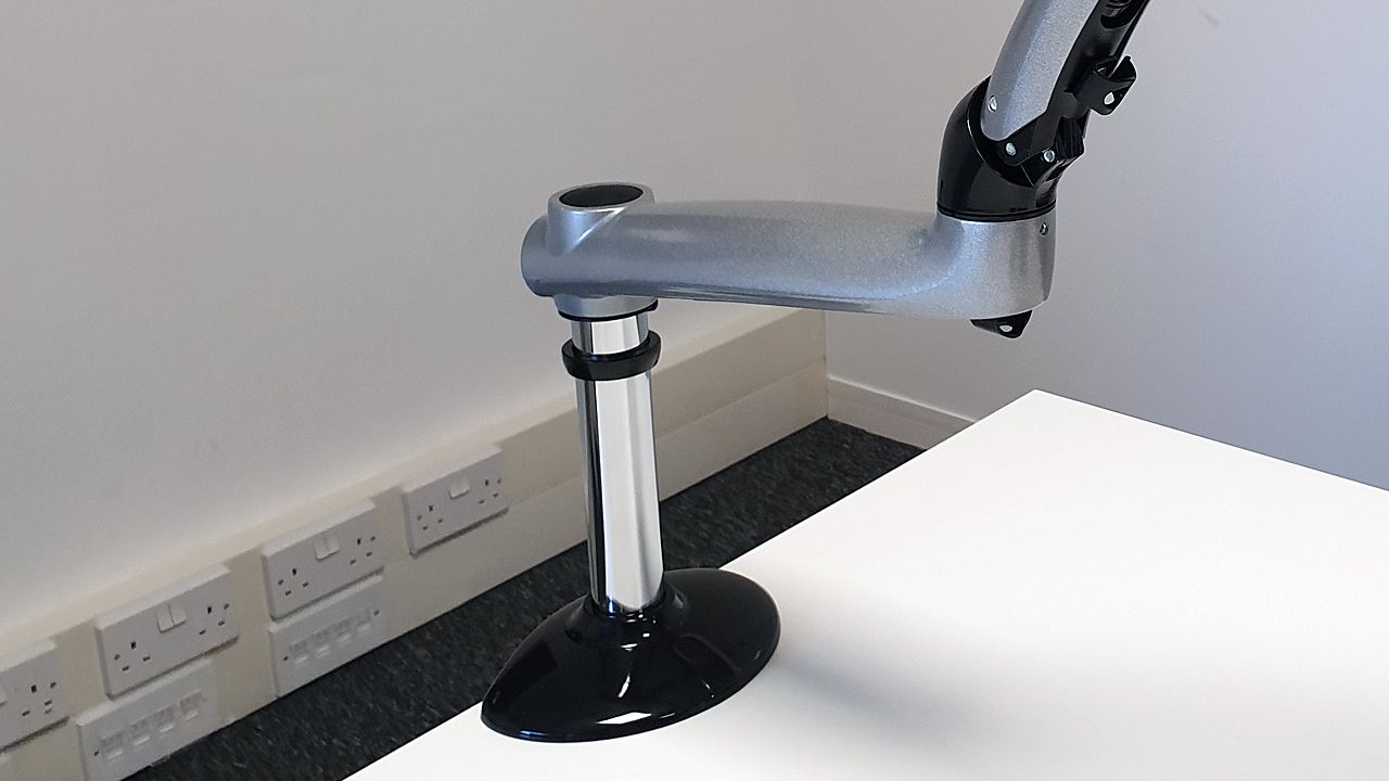 The finished arm is ready to attach by simply sliding down the pole on the desk clamp.