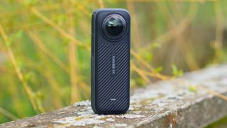 Insta360 X4 360 degree action camera pictured in full