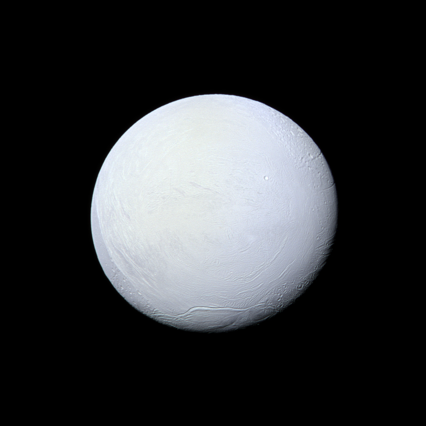 Saturn&#039;s moon Enceladus, covered in snow and ice, resembles a perfectly packed snowball in this image from NASA&#039;s Cassini mission released on Dec. 23, 2013. 