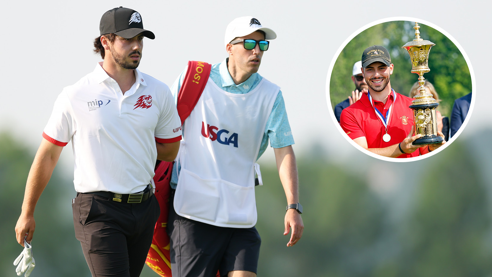 Jose Luis Ballester walks down the fairway with his caddie, while holding the US Amateur trophy