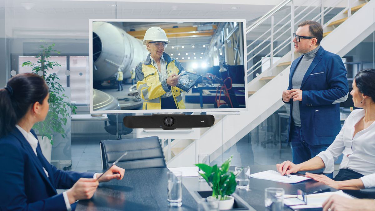 A conference room using AVer certified technology for a video call. 