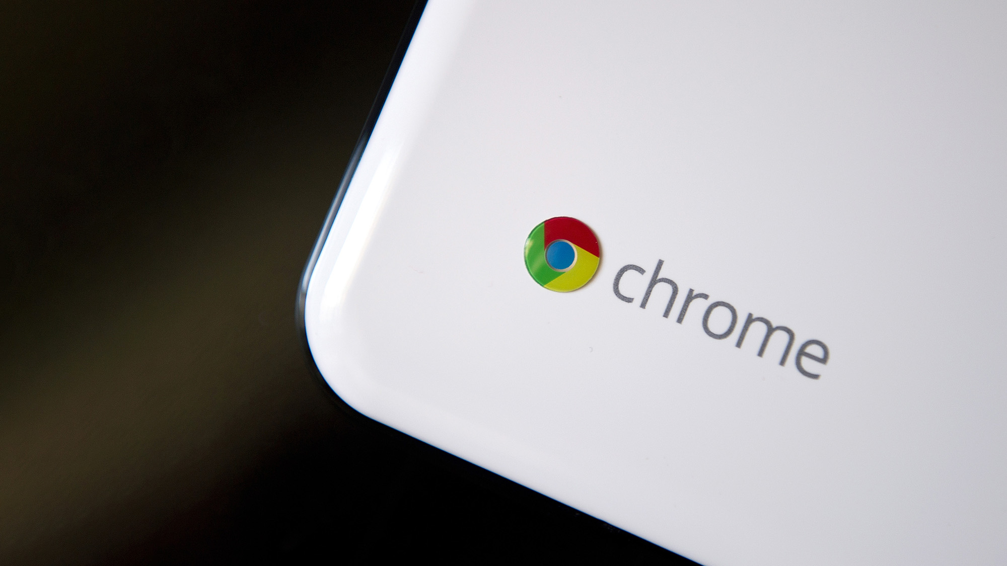 A close-up of the Chrome logo on a Chromebook