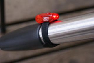Astrogizmo's Kick-Me-Nots are small red LED blinking lights that you can affix to each tripod leg via Velcro strips. They are handy for preventing mishaps around the telescope, and for finding your setup in the dark.