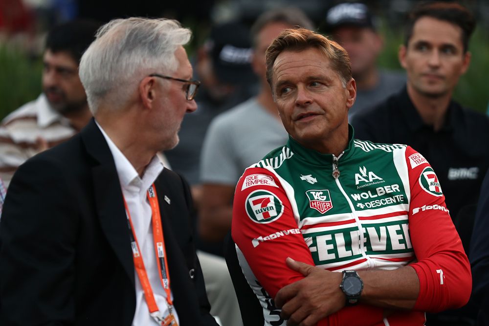 Former professional Dag Otto Lauritzen (r) chats to UCI President Brian Cookson at a press conference to announce Tag Heuer as a new sponsor of the BMC Cycling team