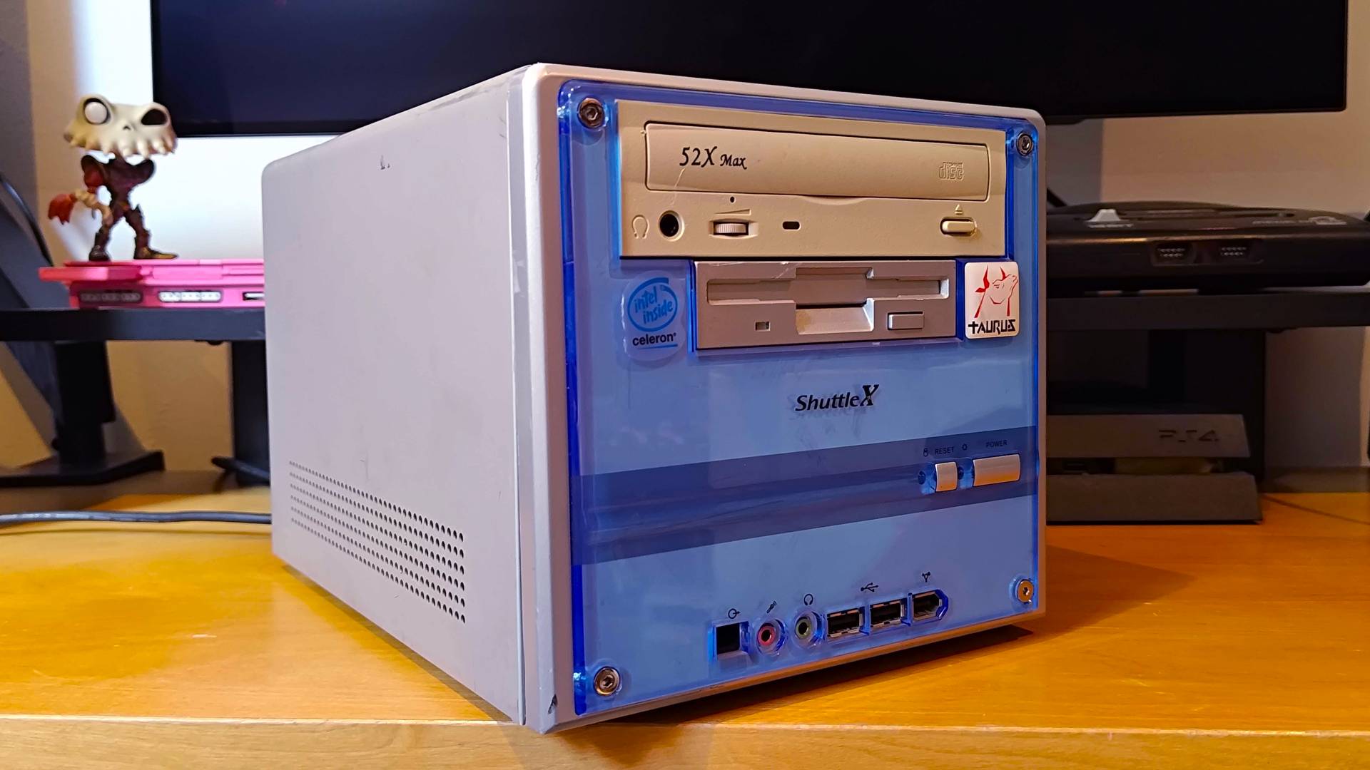 Angled view of Shuttle XPC with silver side panels and blue front.