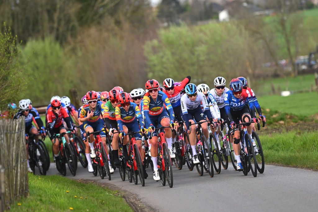 WAREGEM BELGIUM MARCH 27 LR Elisa Longo Borghini of Italy Shirin van Anrooij of The Netherlands Ellen van Dijk of The Netherlands and Team Lidl Trek Demi Vollering of The Netherlands Mischa Bredewold of The Netherlands Lotte Kopecky of Belgium and Team SD Worx Protime Grace Brown of Australia and Team FDJ SUEZ compete during the 12nd Dwars door Vlaanderen 2024 Womens Elite a 1299km one day race from Waregem to Waregem on March 27 2024 in Waregem Belgium Photo by Luc ClaessenGetty Images