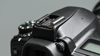The Nikon D780 hot shoe mount in gunmetal gray