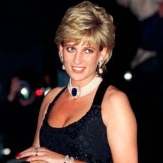 Princess Diana wearing a pearl choker and sequined dress
