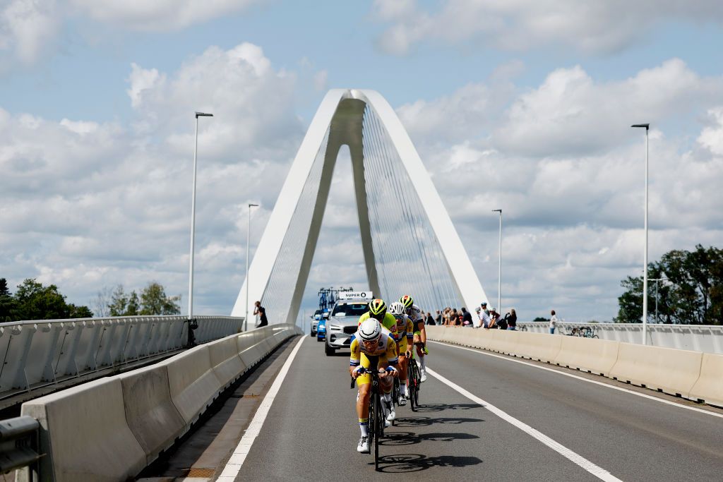 PEER BELGIUM AUGUST 26 A general view of Kamiel Bonneu of Belgium and Team FlandersBaloise Ludovic Robeet of Belgium and Team Bingoal WB White Combativity Jersey Aaron Van Poucke of Belgium and Team FlandersBaloise and Criel Desal of Belgium and Team Bingoal WB compete in the breakaway during the 19th Renewi Tour 2023 Stage 4 a 1794km stage from Beringen to Peer UCIWT on August 26 2023 in Peer Belgium Photo by Bas CzerwinskiGetty Images