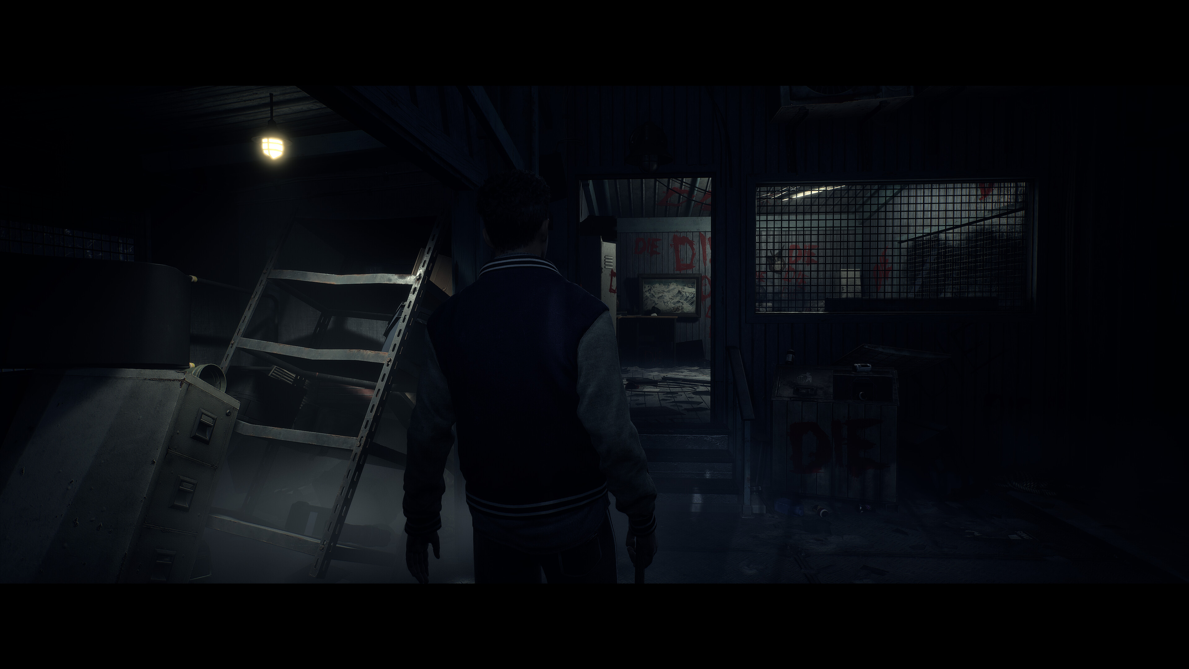 A character exploring a basement in Until Dawn.