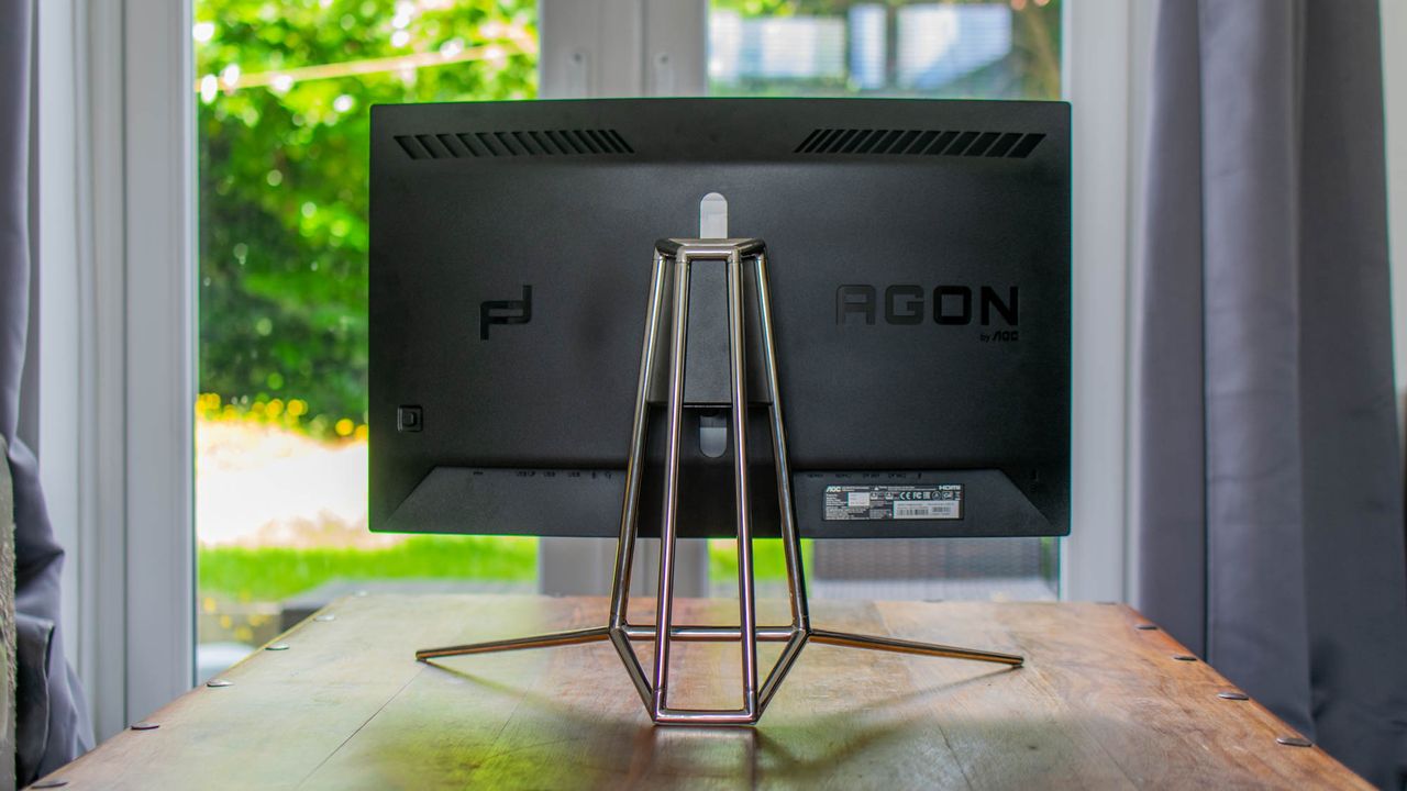 A photograph of the Porsche Design AOC Agon PD27 from the rear