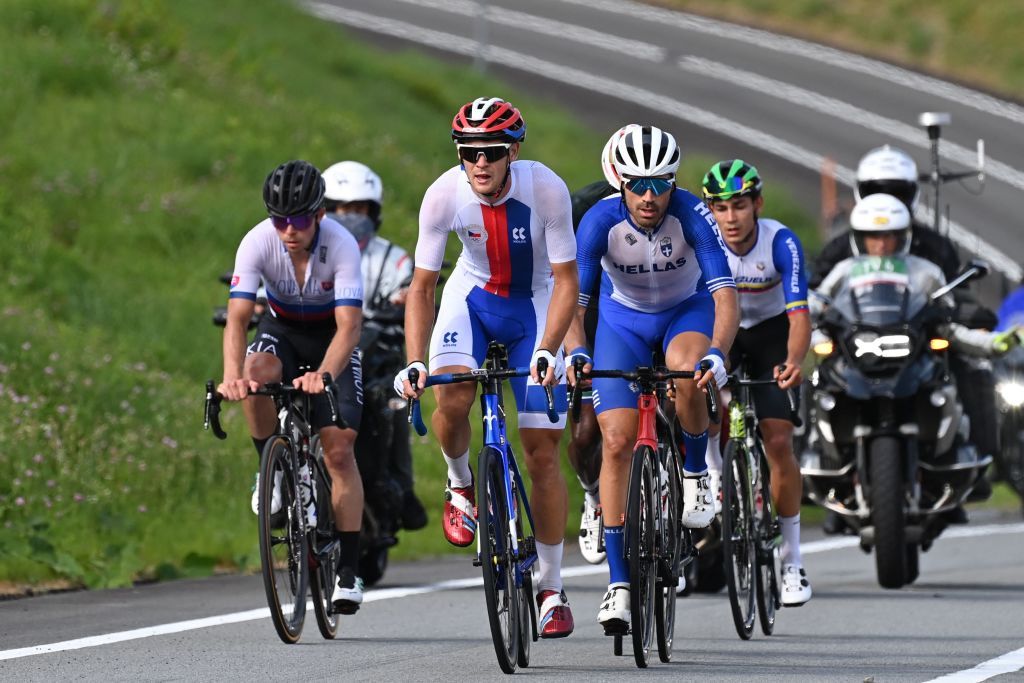 Czech Republics Michael Kukrle 2L leads the breakway group with Greeces Polychronis Tzortzakis 2R Venezuelas Orluis Alberto Aular Sanabria R South Africas Nicholas Dlamini unseen and Slovakias Juraj Sagan L during the first lap of the Fuji International Speedway in the mens cycling road race of the Tokyo 2020 Olympic Games in Oyama Japan on July 24 2021 Photo by Greg Baker AFP Photo by GREG BAKERAFP via Getty Images