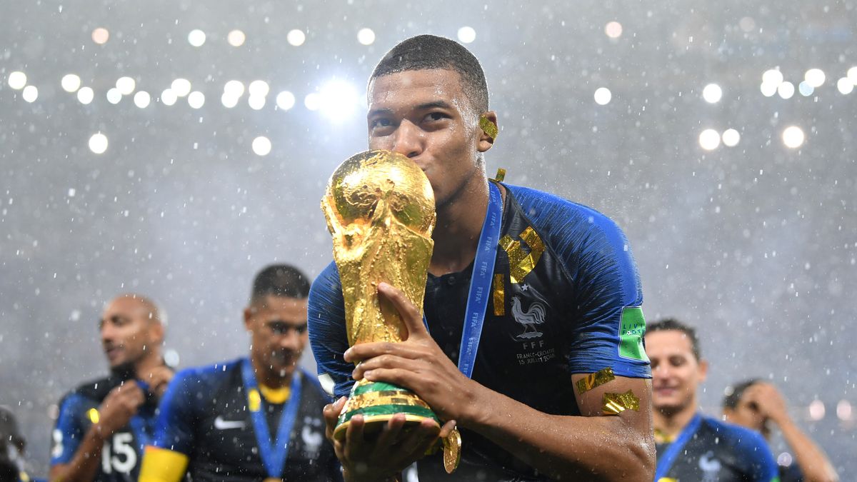  Kylian Mbappe – star of a new BBC documentary titled Mbappe – celebrates with the World Cup trophy following the 2018 FIFA World Cup Final.