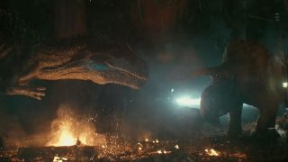 Scene from the movie Jurassic World: Battle at Big Rock. It is night time and here we see a an Allosaurus and Nasutoceratops squaring off over a campfire.
