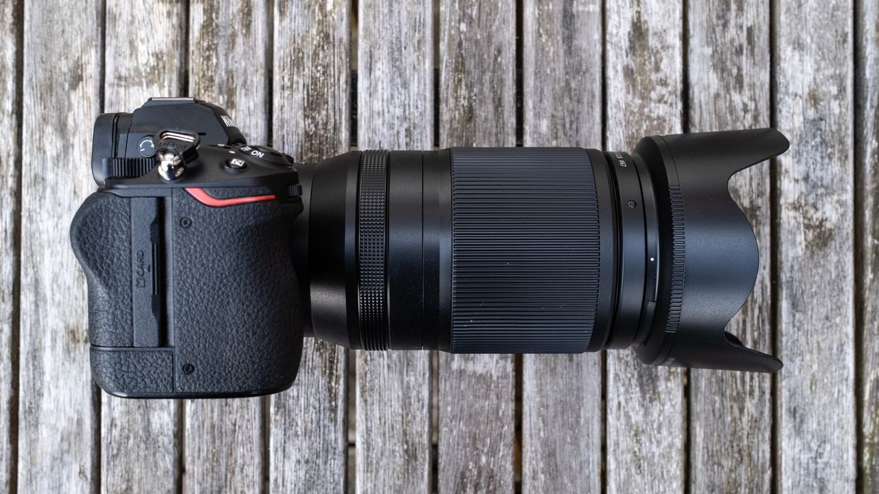 Nikkor Z 70-180mm f/2.8 attached to a Nikon Z 7II on a wooden outdoor table