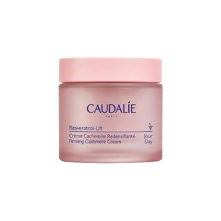 Caudalie Resveratrol-lift Firming Cashmere Cream in light pink packaging with blue lettering.