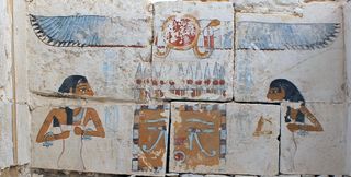A painted scene of the Neith, the goddess of war and wisdom, and Nut, goddess of the sky, protecting the canopic shrine of the pharaoh Woseribre Senebkay.