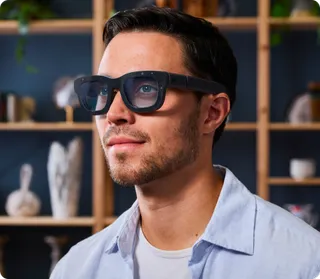 A man wearing augmented reality glasses