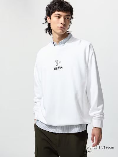 White The Boy and The Heron sweatshirt from the front with the film title printed in the centre