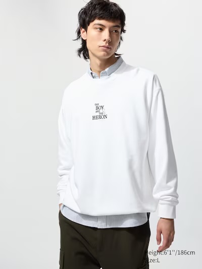 White The Boy and The Heron sweatshirt from the front with the film title printed in the centre