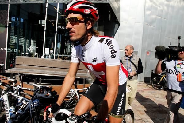 Fabian Cancellara (Switzerland) rolls to the start.