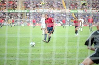 Gaizka Mendieta scores a penalty for Spain against France at Euro 2000.