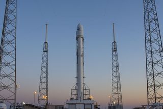 Falcon 9 and JCSAT-14 on the Pad