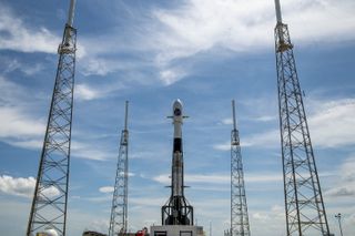 A SpaceX Falcon 9 rocket carrying the SAOCOM 1B Earth-observation satellite and two rideshare payloads stands atop Space Launch Complex 40 at Cape Canaveral Air Force Station for an Aug. 30, 2020 launch.