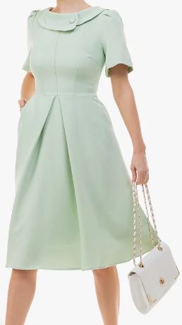 Queen Camilla's mint green Ascot dress with fringed cuffs | Woman & Home Queen Camilla's mint green Ascot dress with fringed cuffs | Woman & Home