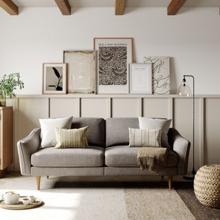 Greige sofa with cushions in neutral living room
