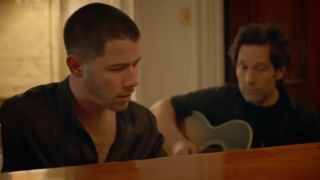 Nick Jonas and Paul Rudd are shown in the trailer for Power Ballad.