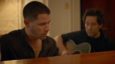 Nick Jonas and Paul Rudd are shown in the trailer for Power Ballad.