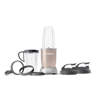 A Nutribullet blender with lids and cups