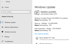 Skærmbillede af processen med at downloade og installere Windows 11