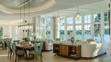 Expansive open plan living room diner with lake view