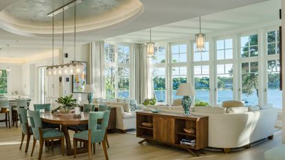 Expansive open plan living room diner with lake view