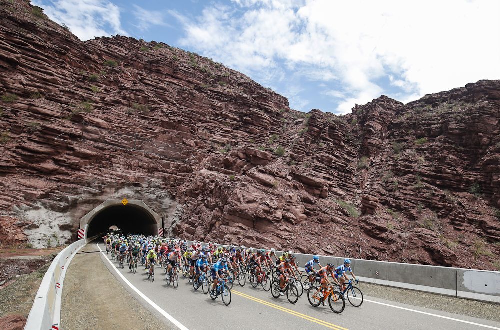 The peloton emerges from a tunnel en route to Villa San Agust&iacute;n during stage 4 in San Juan