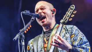 Trivium singer/guitarist Matt Heafy onstage in 2025