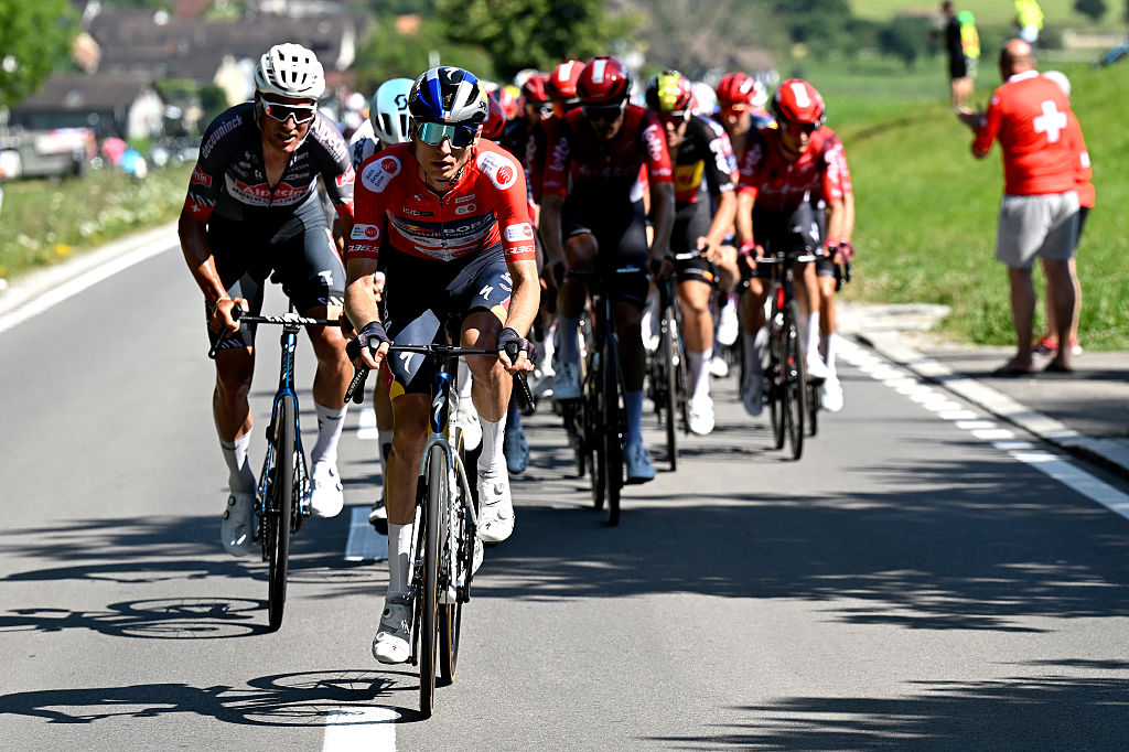 NEUHAUSEN AM RHEINFALL, SWITZERLAND - JUNE 20: Aleksandr Vlasov of Russia and Team Red Bull - BORA - hansgrohe - Red Mountain Jersey competes during the 88th Tour de Suisse 2025, Stage 6 a 186.7km stage from Chur to Neuhausen am Rheinfall / #UCIWT / on June 20, 2025 in Neuhausen am Rheinfall, Switzerland. (Photo by Tim de Waele/Getty Images)