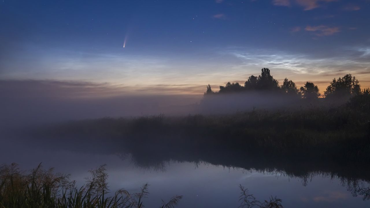 starry night sky with lake